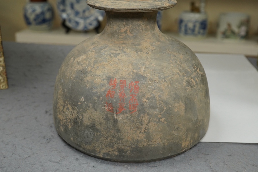 Four very rare Chinese inscribed pottery jars, Han dynasty